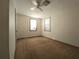 Well-lit bedroom with two windows and ceiling fan at 1708 Preston S St, St Petersburg, FL 33712