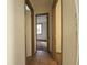 Simple hallway with tile flooring and access to bedrooms at 1708 Preston S St, St Petersburg, FL 33712