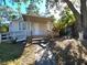 Front view of house, showing entrance and landscaping at 1708 Preston S St, St Petersburg, FL 33712