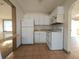 White kitchen with appliances and ample cabinet space at 1708 Preston S St, St Petersburg, FL 33712