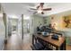 Dining area with table and chairs, adjacent to kitchen and living room at 195 114Th Ne Ave # 195, St Petersburg, FL 33716