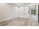 Spacious office with light wood flooring and an open door at 19504 Sheltered Hill Dr, Brooksville, FL 34601