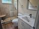 Modern bathroom with a walk-in shower and quartz vanity at 2359 Finlandia Ln # 27, Clearwater, FL 33763