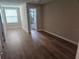 Spacious bedroom with hardwood floors and an ensuite bathroom at 2359 Finlandia Ln # 27, Clearwater, FL 33763