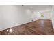 Bright living area with new hardwood floors, fresh white paint and recessed lighting, creating a cozy, modern space at 2503 E 19Th Ave, Tampa, FL 33605