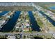 Aerial view of waterfront property with canal access at 3306 Holly Springs Dr, Hernando Beach, FL 34607