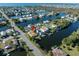 Aerial view of waterfront home with private dock and canal access at 3306 Holly Springs Dr, Hernando Beach, FL 34607
