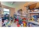 Workshop with various tools and storage shelving at 397 Doniphan Dr, Port Charlotte, FL 33954