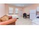 Studio apartment with sofa bed, small kitchen, and dining table at 397 Doniphan Dr, Port Charlotte, FL 33954