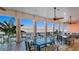 Expansive community patio with bay views, seating, and ceiling fans at 4832 Cobia Se Dr # B, St Petersburg, FL 33705