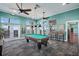 Relaxing game room with pool table and water views at 4832 Cobia Se Dr # B, St Petersburg, FL 33705