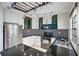 Modern kitchen with stainless steel appliances and granite counters at 4832 Cobia Se Dr # B, St Petersburg, FL 33705