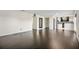 Open concept living room and kitchen with dark hardwood floors at 4832 Cobia Se Dr # B, St Petersburg, FL 33705