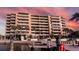 Exterior of condo building with waterfront views and docks at 5701 Mariner St # 502, Tampa, FL 33609