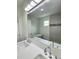 Modern bathroom with double vanity, soaking tub, and walk-in shower at 5714 Olive Dr, New Port Richey, FL 34652