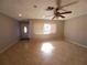 Living room featuring tile floors and access to the entryway at 5705 103Rd N Ter, Pinellas Park, FL 33782