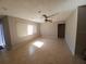 Bright living room with tile floors and neutral walls at 5705 103Rd N Ter, Pinellas Park, FL 33782