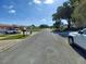 Residential street showcasing well-maintained homes at 5705 103Rd N Ter, Pinellas Park, FL 33782