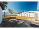 Large backyard with fenced area and trees at 9102 Post Oak Ct, Tampa, FL 33615