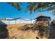 Large backyard with fenced area and trees at 9102 Post Oak Ct, Tampa, FL 33615