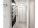 Bright hallway with tiled floor and access to other rooms at 9102 Post Oak Ct, Tampa, FL 33615