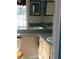 Clean bathroom with double vanity and updated fixtures at 1291 S Disston Ave, Tarpon Springs, FL 34689
