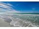 Ocean view from beach with surf and white sand at 1390 Gulf Blvd # 1204, Clearwater, FL 33767