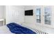 Bright bedroom with water view, large closet, and plush bedding at 1390 Gulf Blvd # 1204, Clearwater, FL 33767