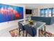Bright dining area with glass table and ocean view at 1390 Gulf Blvd # 1204, Clearwater, FL 33767
