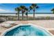 Enjoy beachfront views from the private hot tub and lounge area with beach access at 1390 Gulf Blvd # 1204, Clearwater, FL 33767