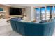 Living room with sectional sofa and ocean view at 1390 Gulf Blvd # 1204, Clearwater, FL 33767
