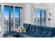 Living area with sectional sofa and water views at 1390 Gulf Blvd # 1204, Clearwater, FL 33767