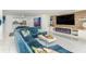 Living room with sectional sofa and fireplace at 1390 Gulf Blvd # 1204, Clearwater, FL 33767