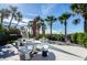 Well maintained outdoor patio with picnic tables, lounge chairs and grills at 1390 Gulf Blvd # 1204, Clearwater, FL 33767