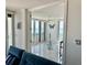 Sunroom with balcony access and water views at 1390 Gulf Blvd # 1204, Clearwater, FL 33767