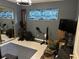 Room with exercise equipment, TV, and plenty of space at 14492 Tanglewood N Dr, Largo, FL 33774