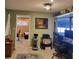 Stylish home office with modern decor, a comfortable workspace, and ample natural light at 14492 Tanglewood N Dr, Largo, FL 33774