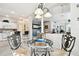Charming dining area with kitchen and living room views at 1687 Starling Drive, Tarpon Springs, FL 34689
