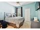Spacious bedroom with a comfortable bed and plenty of natural light at 1687 Starling Drive, Tarpon Springs, FL 34689