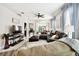 Spacious living area with a sectional sofa and large screen TV at 1687 Starling Drive, Tarpon Springs, FL 34689