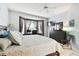 Spacious main bedroom with a king bed and built-in desk at 1687 Starling Drive, Tarpon Springs, FL 34689