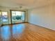 Living room with hardwood floors and view of the exterior at 2284 Philippine Dr # 9, Clearwater, FL 33763