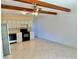 Kitchen area with tile floor and wood beams at 2284 Philippine Dr # 9, Clearwater, FL 33763