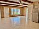 Living area with tile floors and wood beams at 2284 Philippine Dr # 9, Clearwater, FL 33763