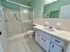 Clean bathroom with shower, vanity, and tiled floors at 2284 Philippine Dr # 9, Clearwater, FL 33763