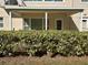 Exterior view showcasing the building's architecture and landscaping at 2284 Philippine Dr # 9, Clearwater, FL 33763