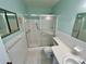 Bathroom featuring a shower, vanity with sink, and toilet at 2284 Philippine Dr # 9, Clearwater, FL 33763