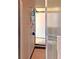 Shower with tiled walls and built-in shelving at 2460 W Marion Ave, Punta Gorda, FL 33950