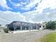 Home exterior showcasing pool and lanai at 2460 W Marion Ave, Punta Gorda, FL 33950