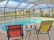 Relaxing pool area with patio furniture at 2460 W Marion Ave, Punta Gorda, FL 33950